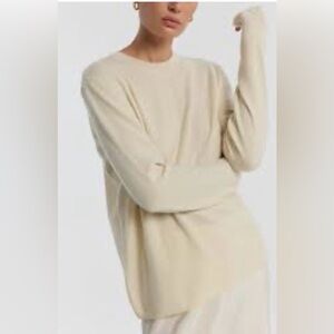 Elegant 2-ply Cashmere Cream Sweater for Women in size medium